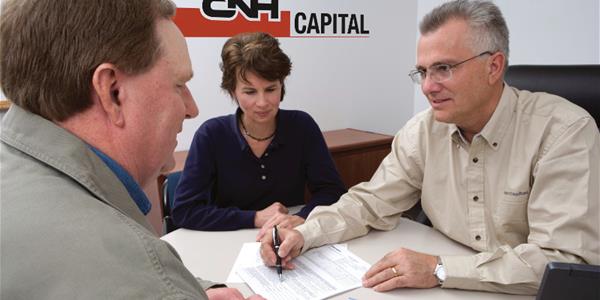 CNHi Capital Financing Document Signing View customer learning about financing options through CNHi Capital and Titan Machinery