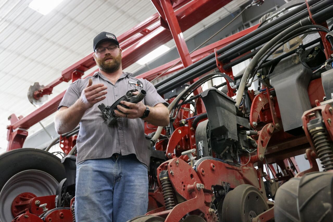 Web_Version_150-Tech 2 Titan tech working on planter