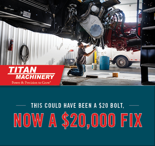 Titan Machinery Technician Workin On A Header With Quote
