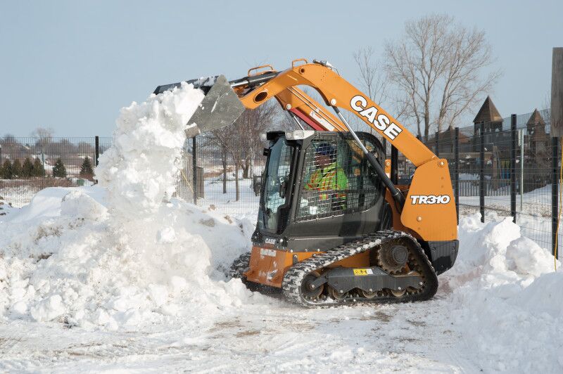 CASE TR310 CTL Dumping Snow