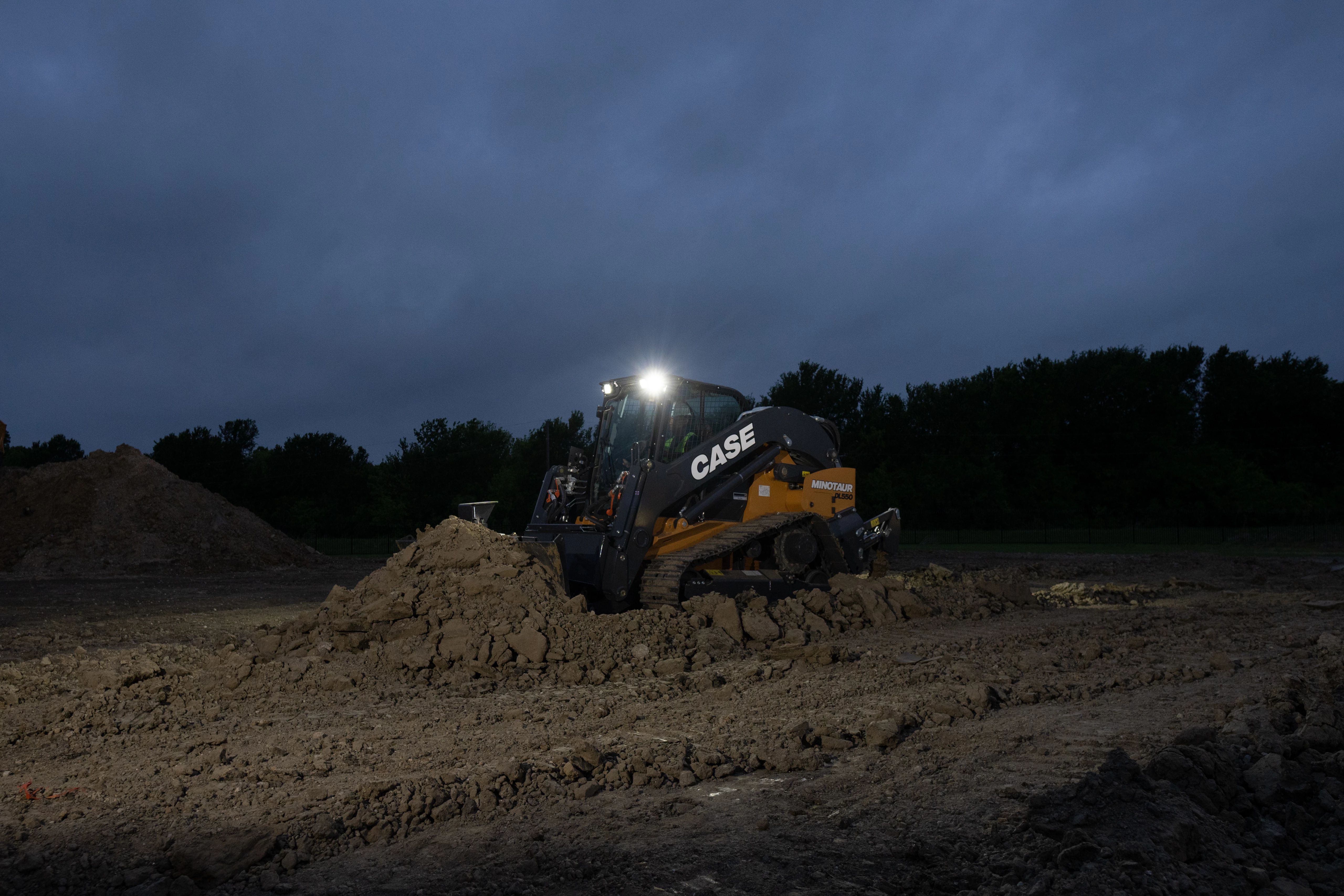 CASE Minotaur DL550 Compact Dozer Loader at Night