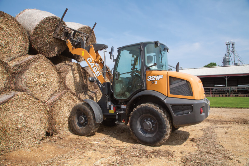 Compact Wheel Loader loading hay bales